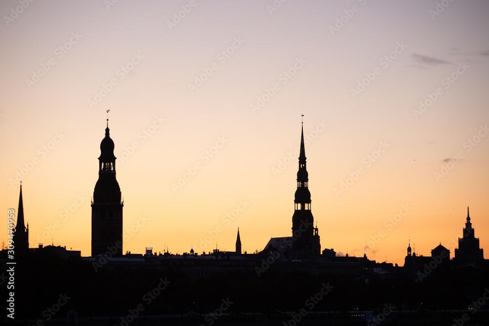 Riga panorama silhouette. City skyline at sunrise