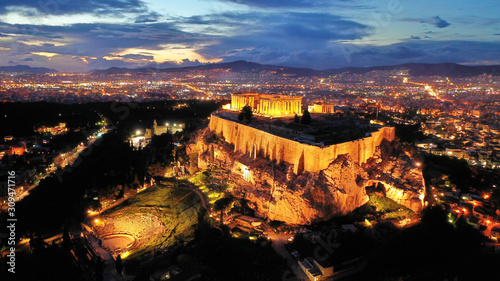 Aerial drone photo of illuminated Acropolis hill and Masterpiece Parthenon with beautiful colours at dusk, Athens, Attica, Greece
