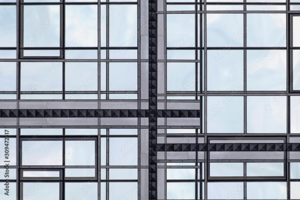 Realistic though unreal reworked photo of modern glass architecture. Windows of different shapes. Financial business building. Hi-tech composition with rectangular frames background and sky reflection Realistic though unreal reworked photo of modern glass architecture. Windows of different shapes. Financial business building. Hi-tech composition with rectangular frames background and sky reflection