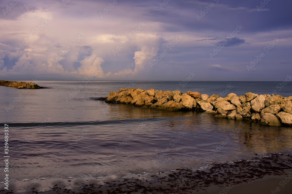 Fototapeta premium sunset on coast of sea