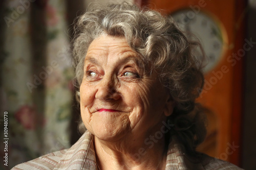 Elderly woman portrait smile face looking away