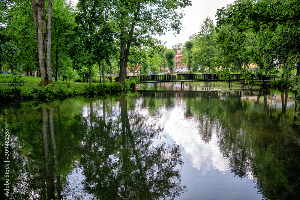 The beautiful summer day in Fiskars Village, Raasepori, Finland. The river is flowing gently and the birds are singing. The beautiful summer day in Fiskars Village, Raasepori, Finland. The river is flowing gently and the birds are singing.