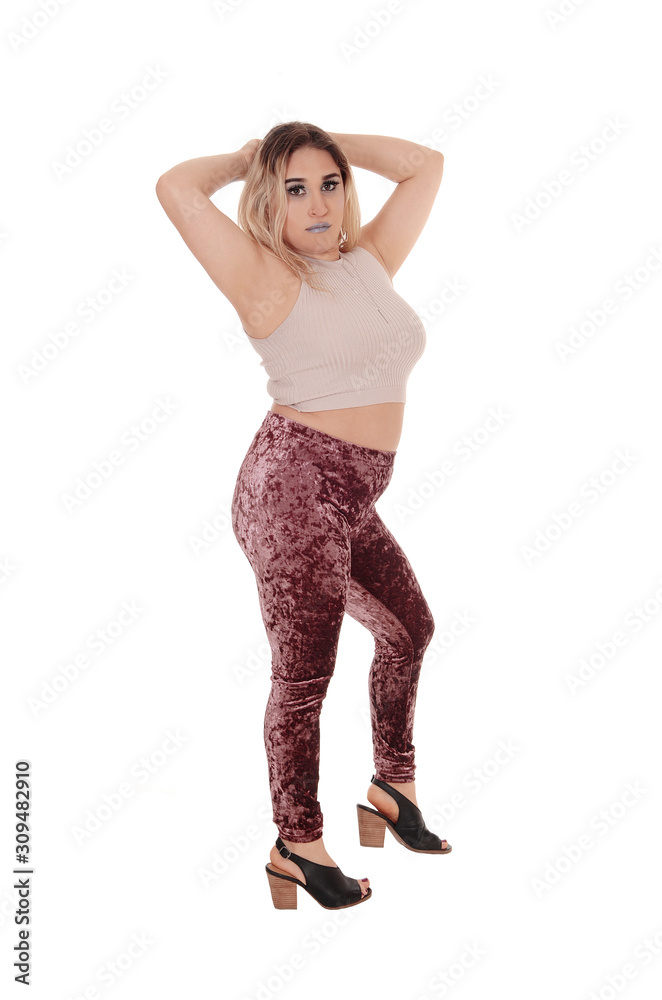 beautiful young woman with her hands behind her head beautiful young woman with her hands behind her head