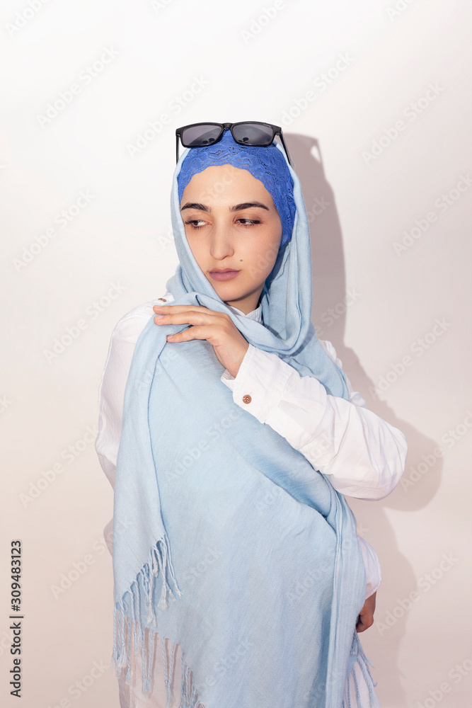 Stylish and elegant Muslim woman in traditional Islamic clothing
