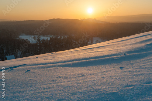 Scenery winter landscape with sunset © ilyaska