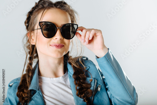 funny girl trying on glasses © Сергей Шиманович
