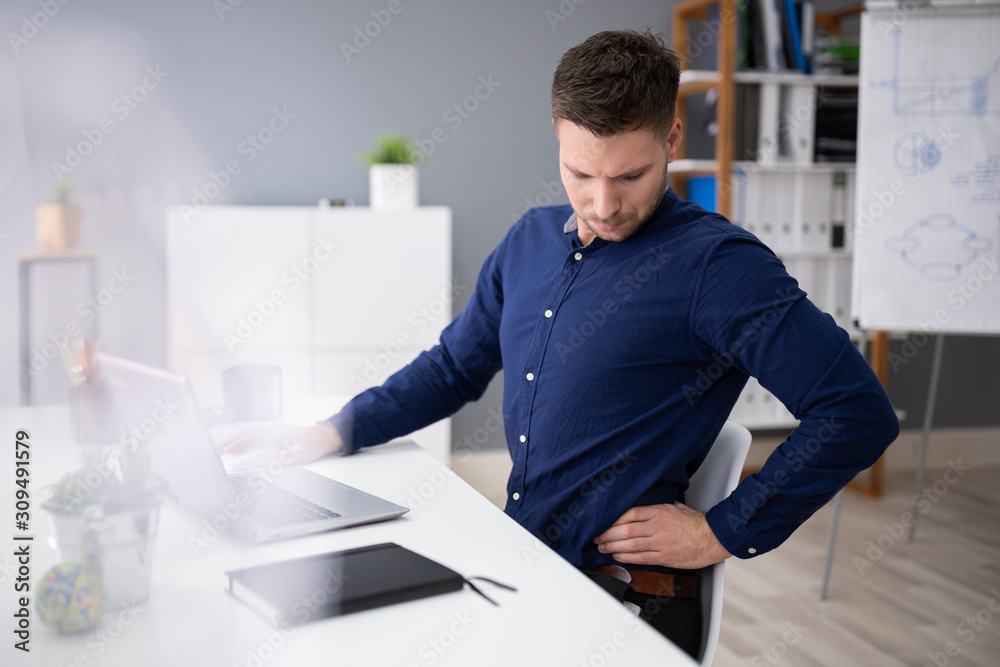 Businessman Suffering From Back Pain