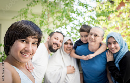 Happy Muslim family selfie portrait