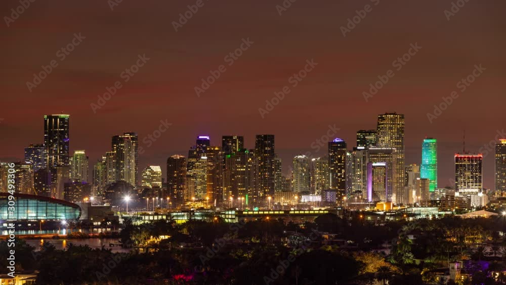 Time lapse of the Miami Florida skyline shot from Miami Beach at sunset Time lapse of the Miami Florida skyline shot from Miami Beach at sunset