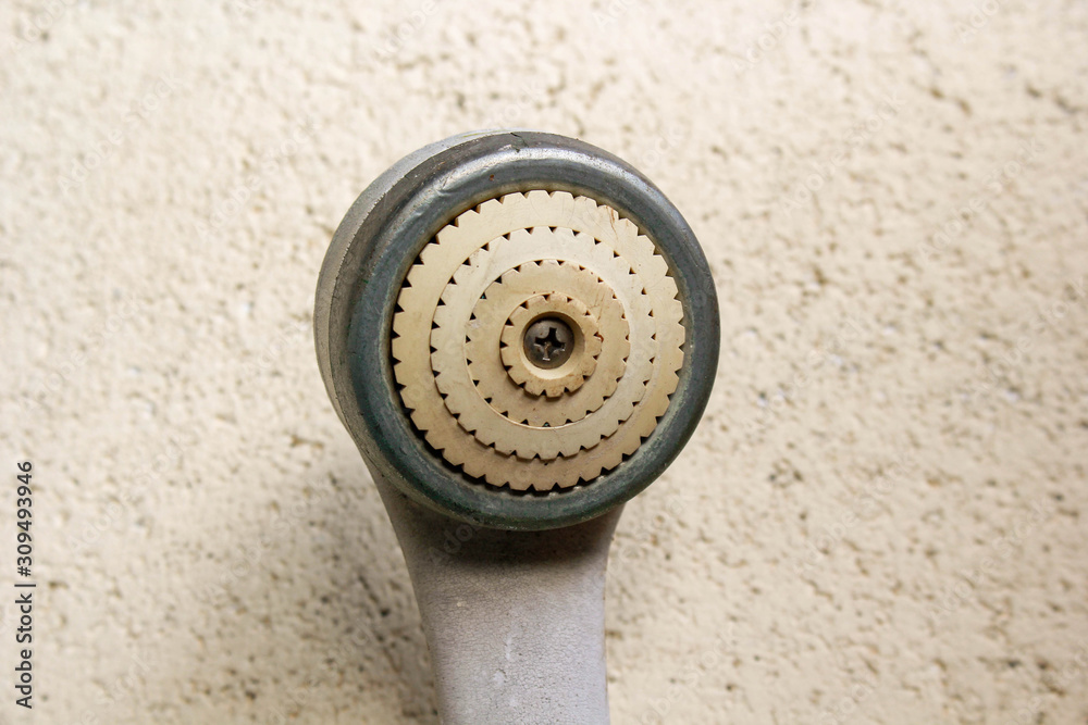 Old style shower, close-up, arranged in the middle of the image.