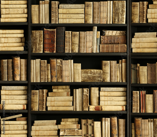 antique books on old wooden shelf.