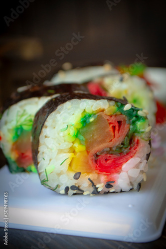 Close up shot of fresh japanese sushi rolls, vartical image