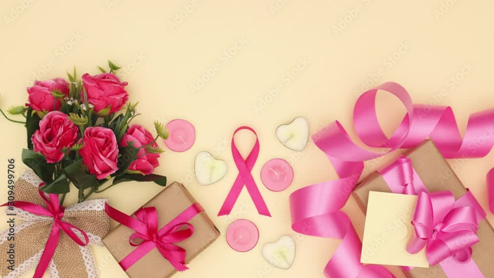 Girly pink decoration for valentine's day, mother's day or birthday appear on yellow background - Stop motion Girly pink decoration for valentine's day, mother's day or birthday appear on yellow background - Stop motion
