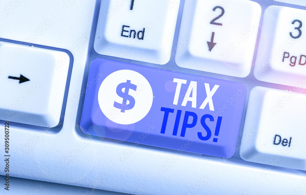 Writing note showing Tax Tips. Business concept for compulsory contribution to state revenue levied by government Writing note showing Tax Tips. Business concept for compulsory contribution to state revenue levied by government