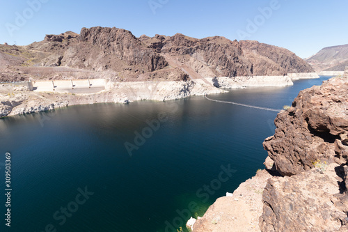 Decreasing water leves at Hoover Dam lake Mead. April 2019, Las Vegas Nevada. calm waters blue sky