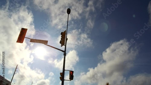 Beautiful Sunny Day White Clouds Moving Fast Street View Driving By Buildings photo