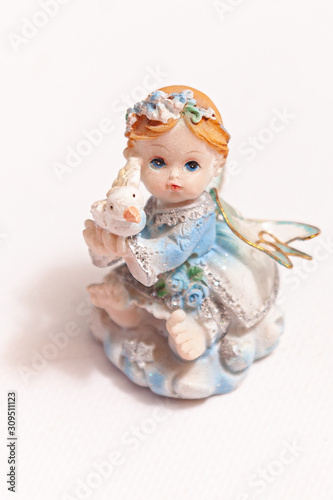 Porcelain doll figurine, little girl toy figurine.