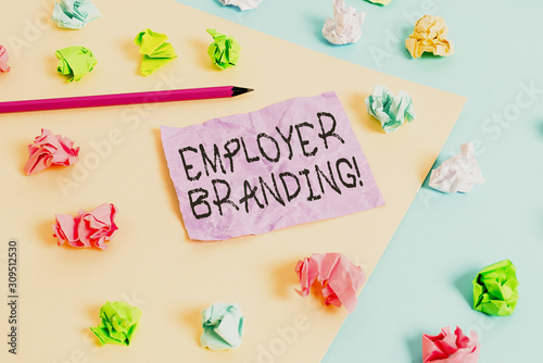 Writing note showing Employer Branding. Business concept for promoting company employer choice to desired target group Colored crumpled papers empty reminder blue yellow clothespin © Artur