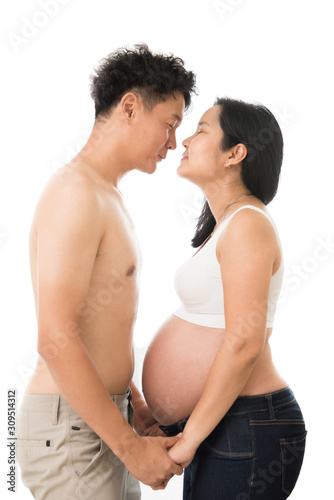 Happy young couple expecting baby