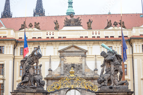 Entrance gate to the Prague Castle (Prazsky Hrad), with a detail on the statues of the Wrestling giants, also called sousosi souboj titanu, a major culture and landmark of the place photo