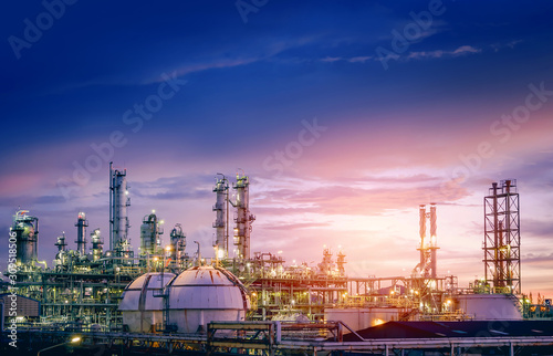 Fototapet Oil and gas refinery plant or petrochemical industry on sky sunset background, F