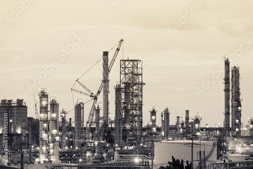 Oil and gas refinery plant or petrochemical industry, Heavy equipment in petroleum industrial plant with monotone