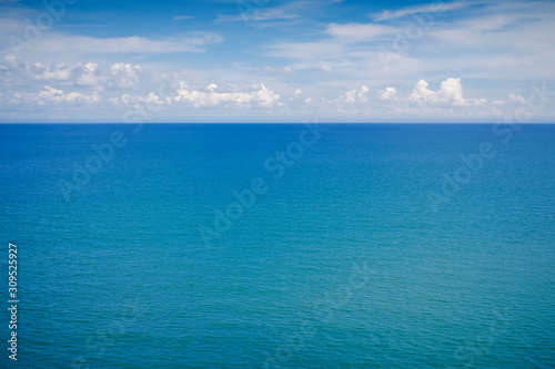 Surface of ocean with blue sky and white cloud, Seascape for summer background
