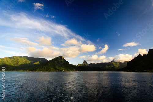 Golden clouds over tropical mountains in Moorea, French Polynesia