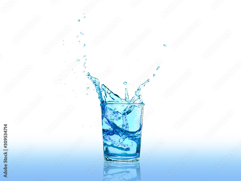 Water splashes in a glass of water isolated on white background Water splashes in a glass of water isolated on white background
