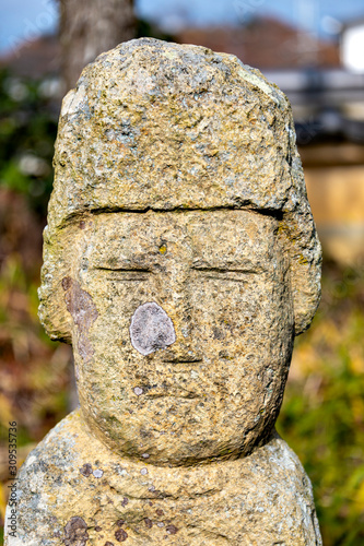 A stone image of the Buddha at Rakan-ji temple in Kasai city, Hyogo prefecture, Japan photo