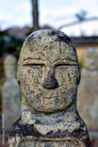 A stone image of the Buddha at Rakan-ji temple in Kasai city, Hyogo prefecture, Japan photo