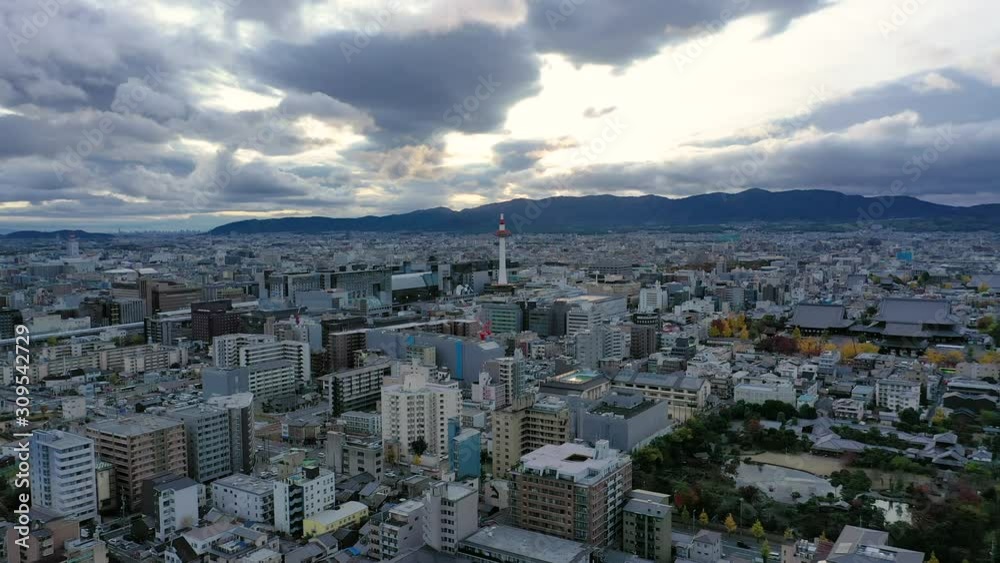 Aerial view 4k video by drone of Kyoto tower and buildings with skyline view in Kyoto city, Japan. evening Aerial view 4k video by drone of Kyoto tower and buildings with skyline view in Kyoto city, Japan. evening