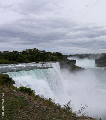 View of the Niagara Falls from the USA side and clouds in the background