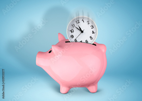 Saveing time concept, piggy bank with clock on blue