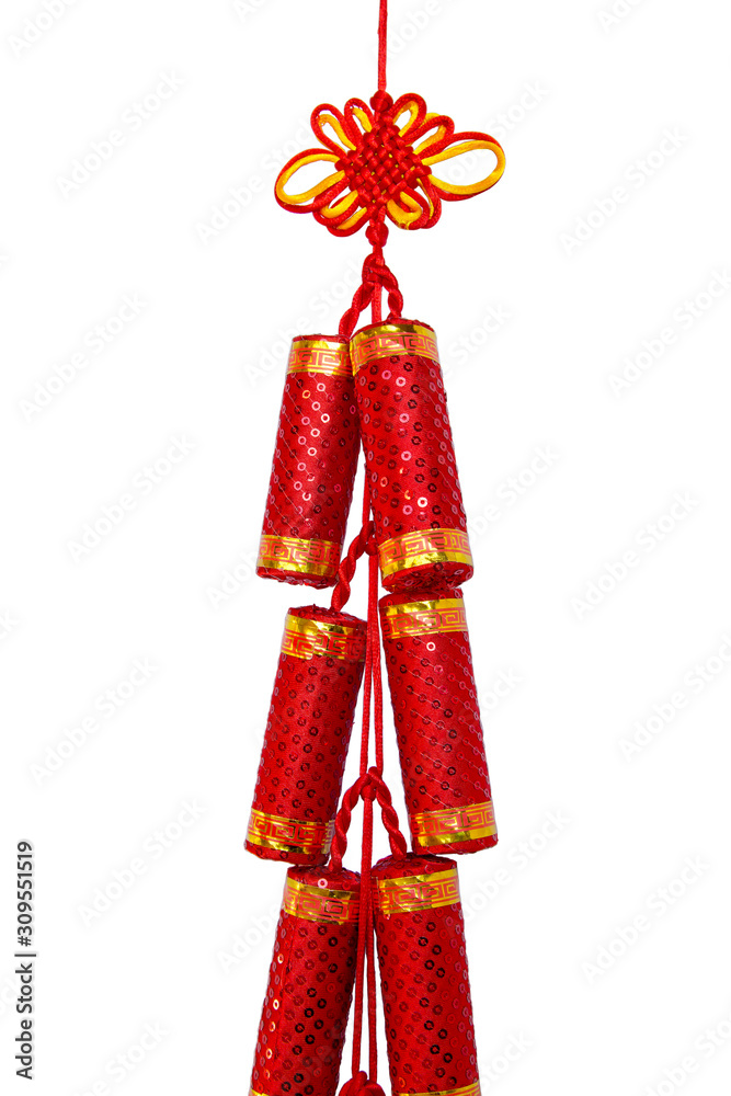 Red Chinese silk knot in form of fire cracker for celebriting new year (manual focus), isolated with clipping path Red Chinese silk knot in form of fire cracker for celebriting new year (manual focus), isolated with clipping path