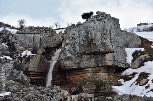 Waterfall and rocks in Sannine mountains Lebanon photo