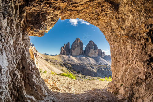 View to Tre Cime di Lavaredo from cave, Dolomites photo