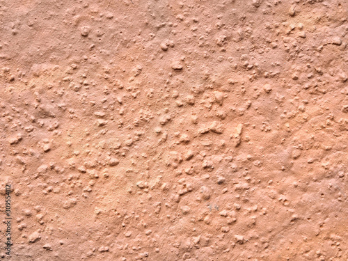 Texture of rugged uneven plaster. Background and pattern