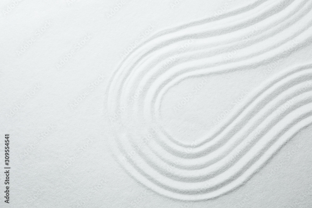 White sand with pattern as background, top view. Zen, meditation, harmony White sand with pattern as background, top view. Zen, meditation, harmony