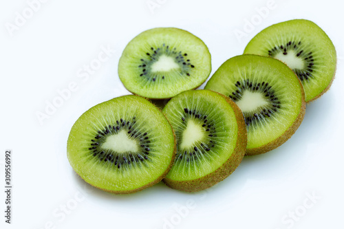 Slice of kiwi fruit isolated on white background.