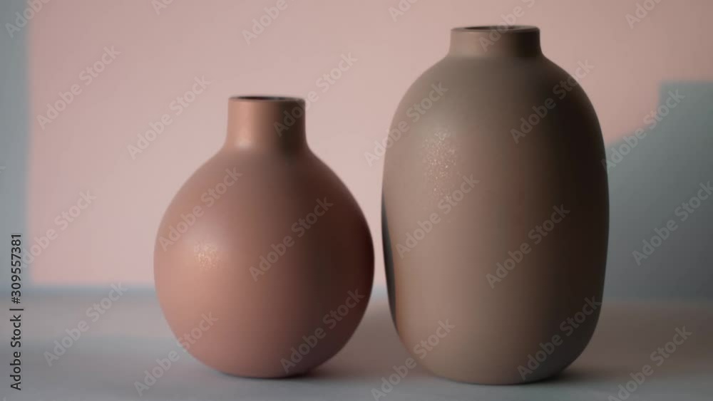 family symbol of man and woman. clay figures in the shape of vessels family symbol of man and woman. clay figures in the shape of vessels