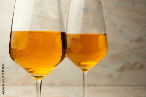 tall glass of rich orange wine