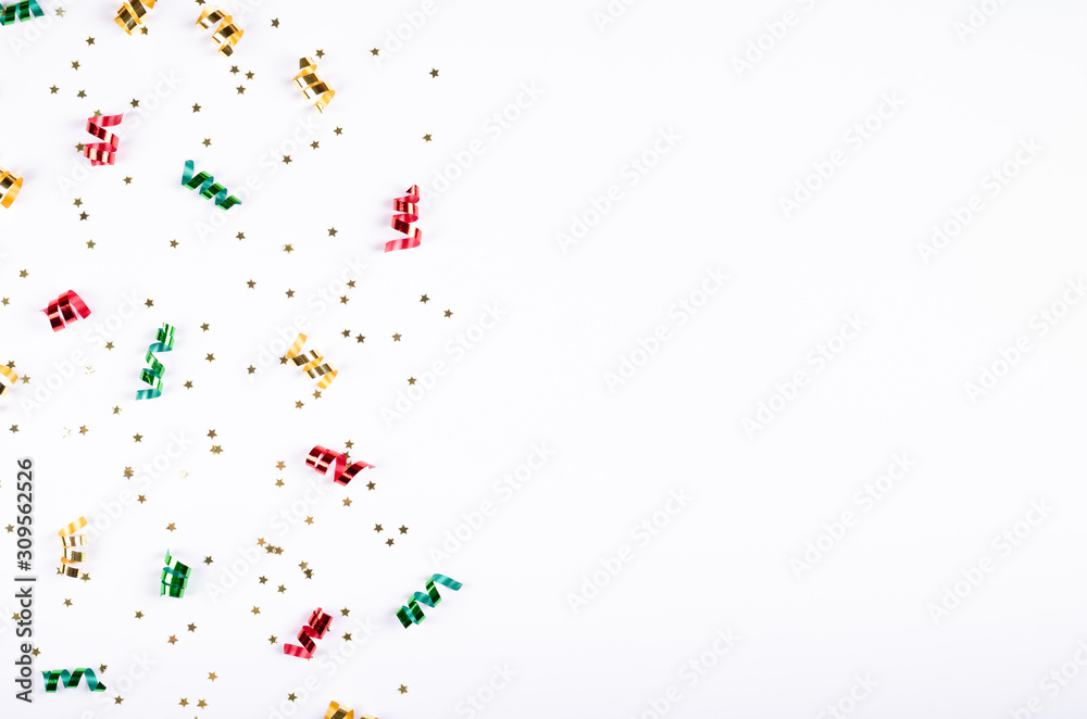 Colored confetti composition on gray background, party and celebration decoration. Colored confetti composition on gray background, party and celebration decoration.