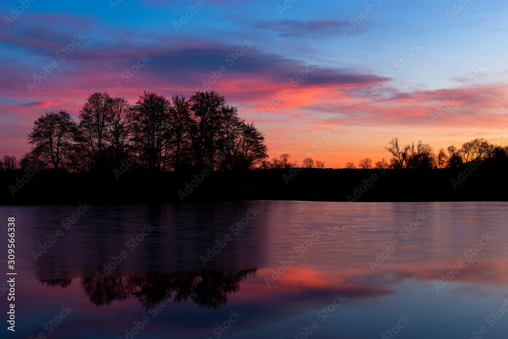 Sunset at czech countryside lake. Dramatic clouds. Sunset at czech countryside lake. Dramatic clouds.