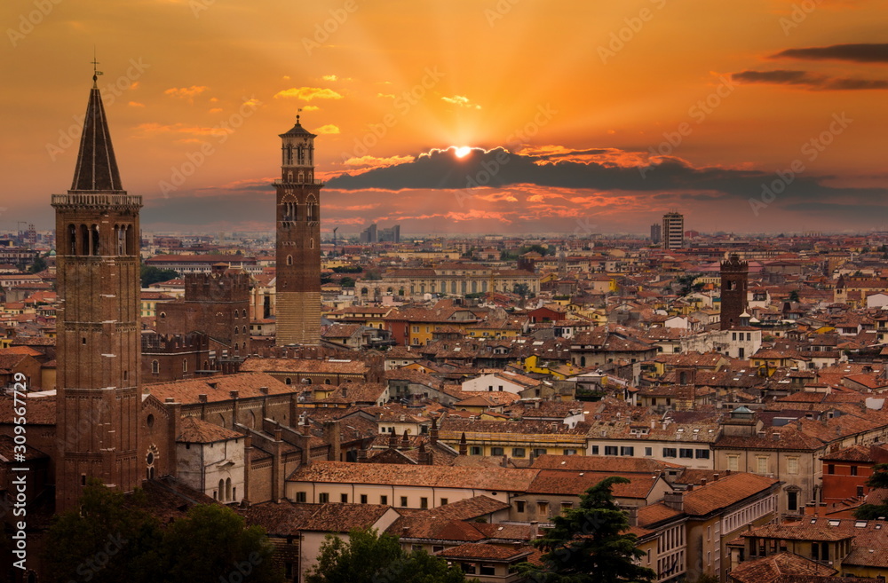 View of Verona. Orange sunset and beautiful sun. Italy.