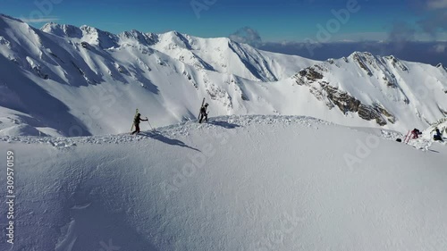 4k aerial footage with ski mountaineers competing during a ski touring and mountaineering race in Fagaras mountains