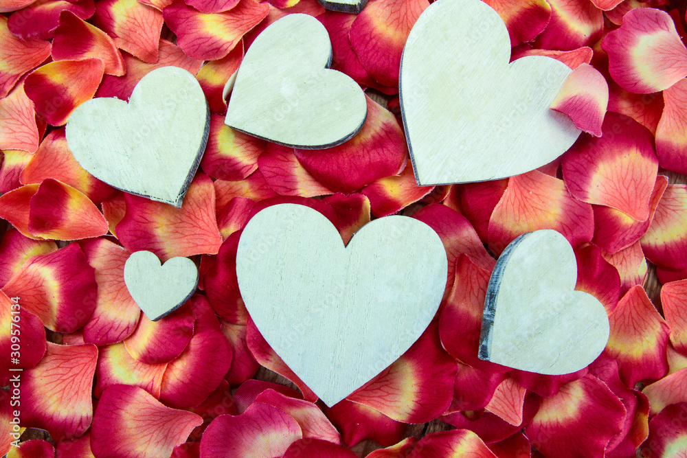Obraz premium hearts on a background of rose petals