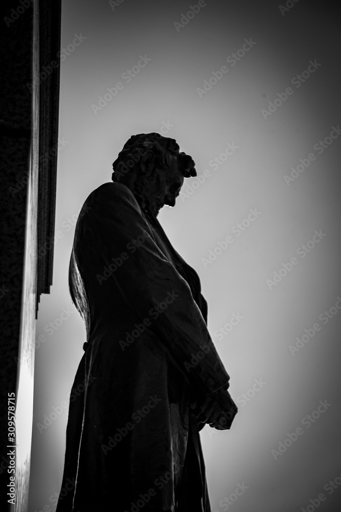 Statue of Abraham Lincoln in front of the Nebraska State Capital building in Nebraska Statue of Abraham Lincoln in front of the Nebraska State Capital building in Nebraska