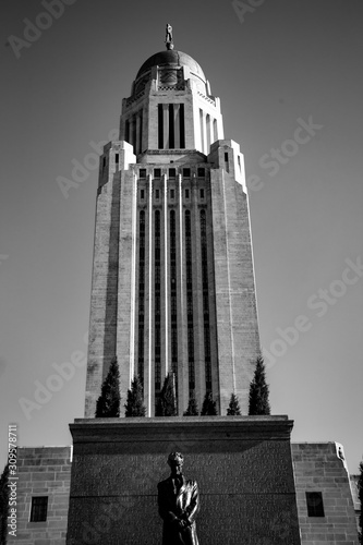 Statue of Abraham Lincoln in front of the Nebraska State Capital building in Nebraska