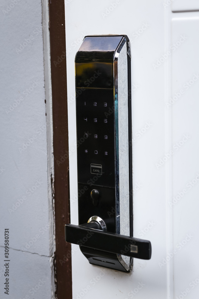 Door access control keypad with keycard reader. Stock Photo | Adobe Stock